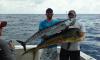 Adam and Mick with a nice wahoo and dolphin pair caught aboard the New Lattitude.jpg